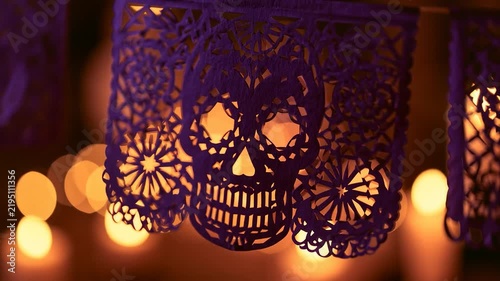 Deep Purple Papel Picado Skull Banner with Warm Candle Bokeh