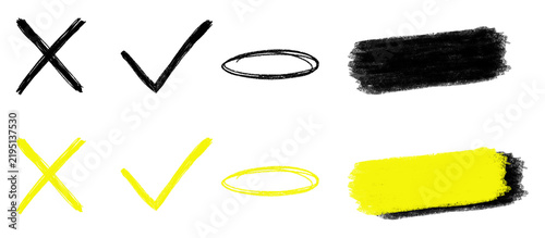 Collection of black and yellow doodle marks including checkmarks, crosses, oval outlines, scribbles, and rough brush strokes for creative graphic design and annotation.