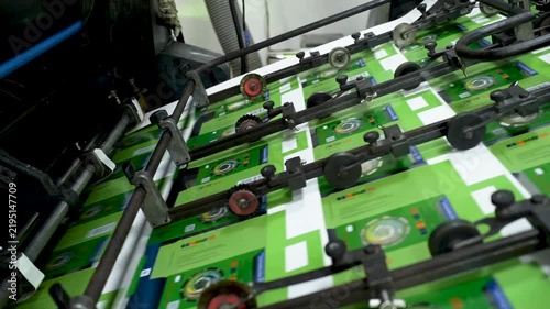 Close Up of Printing Press Mechanical Guide Rollers