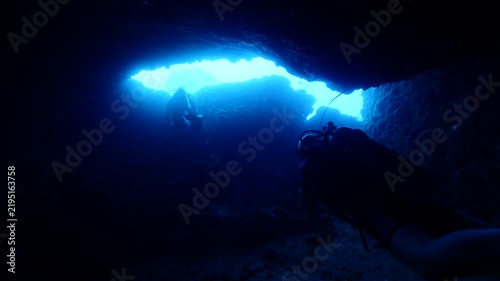 cave diving underwater  ocean scenery sun beams and rays background