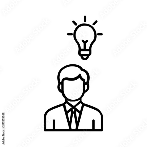 Businessman with a glowing lightbulb above head representing a creative idea