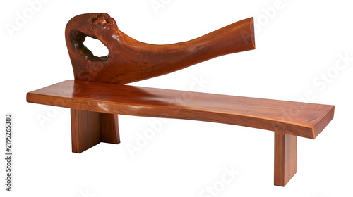 Fotografie Isolated artistic wooden bench with a unique sculptural backrest featuring an or