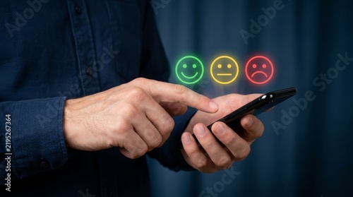 User experience evaluation concept showing happy, neutral, and sad smiley icons on a smartphone.