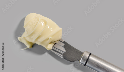 Quadro su tela Melted cheese isolated on grey background, top view