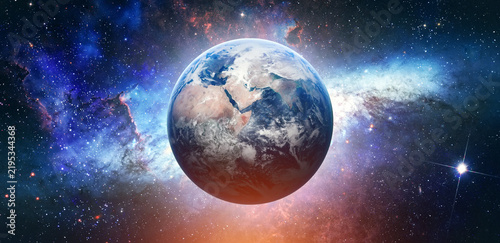 Planet Earth globe in outer space with bright stars and Milky Way galaxy. Sunlight at the dawn of day. Landscape with planet and starry sky. Elements of this image furnished by NASA. Photo collage