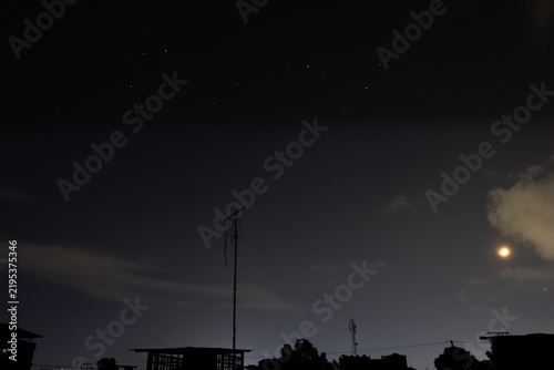 Canvas Print Night sky with moon and clouds. Night sky with moon and clouds.