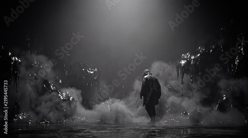 A mysterious hooded figure walks through a dark, foggy cavern surrounded by dripping black tar under a dramatic overhead spotlight in a cinematic black and white scene.