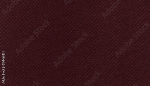 Dark burgundy fabric texture with fine weave and uniform pattern, ideal as an elegant textile background for fashion, upholstery, decor and design.