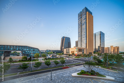 Breathtaking Urban Skyline at Dawn with Modern Architecture and Green Spaces