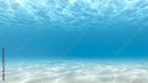 Serene Blue Ocean Horizon with Soft Waves, Sunlight Reflections and Fluffy Clouds Under a Bright Summer Sky, Peaceful Tropical Seascape Nature Background