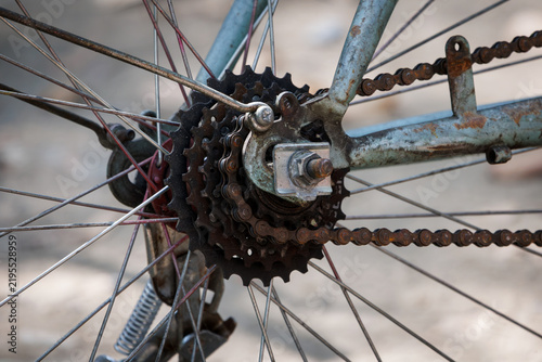 Принти на полотні rusty steel bicycle frame close-up, highlights a multi-speed gear cassette, seve