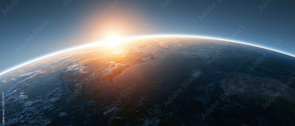 Obraz premium A beautiful bright sun rising over the curved horizon of the planet earth seen from deep space with a dark blue atmosphere above the globe