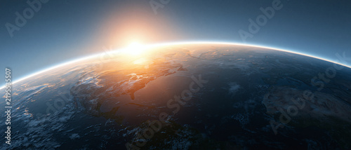 Quadro su tela A beautiful bright sun rising over the curved horizon of the planet earth seen f
