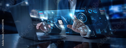 Businessman Analyzing Backup and Cloud Storage Security Data on Digital Screen, Data Disaster Recovery, System File Protection, Server Archiving, Infrastructure Safety
