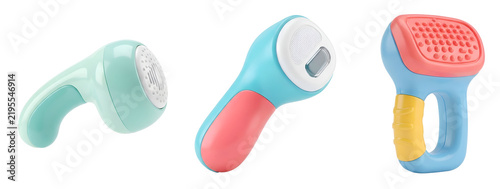 Vibrant electric fabric shavers and clothing lint remover tools featuring pastel blue green yellow and coral plastic bodies displayed together as studio objects on transparent background