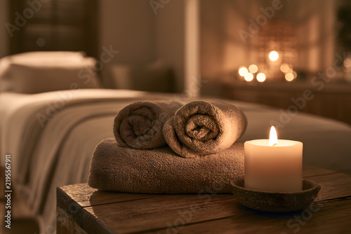 Serene Spa Treatment Room with Soft Ambient Lighting and Towels