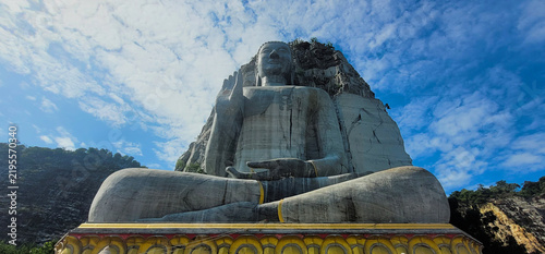 A large stone Buddha  carved