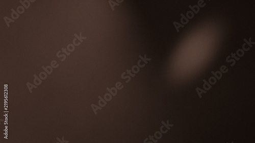 Dark grainy abstract background with a rust-orange cone, soft directional spotlight, radial gradient, matte finish, and subtle film noise texture