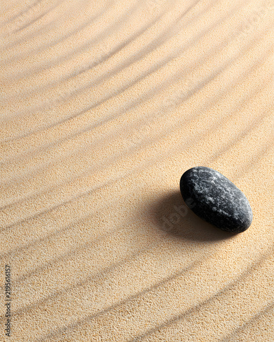 Smooth Black Stone on Fine Sand with Gentle Wind Ripples in Nature Scene