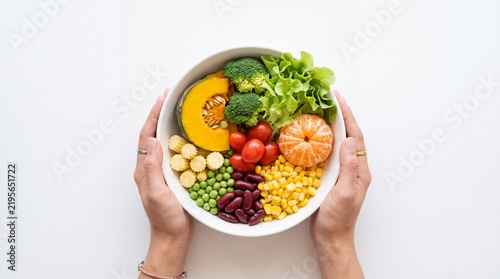 Person hands holding a bowl for world vegetarian day celebration