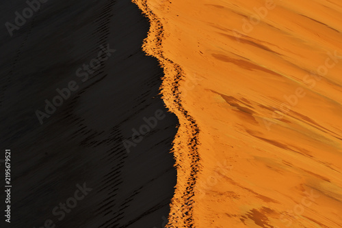 Footprints on a dune on the Namib Desert Namibia