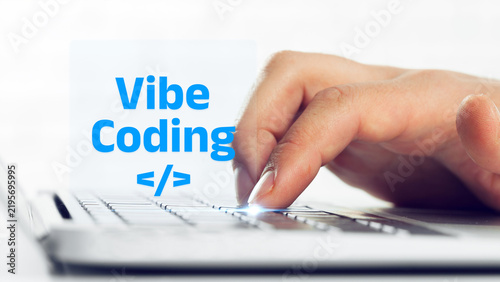 Fotografie Engagement in vibe coding with hands on a keyboard