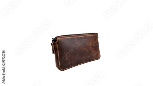 Obraz na plátně Vintage brown leather wallet purse isolated on dark background