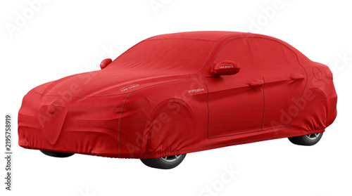Foto Red car covered with fabric, revealing sleek sedan silhouette keywords: car, aut