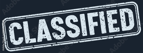classified white grunge stamp on dark blue background. classified stamp