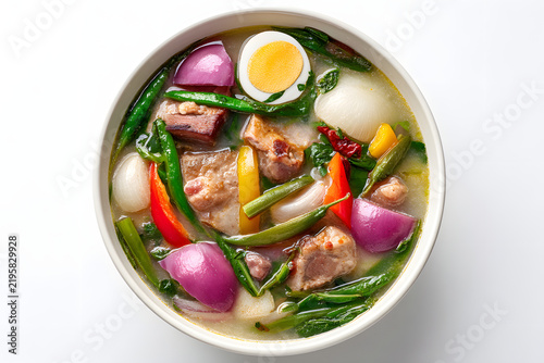 Traditional Filipino Sinigang na Baboy Soup with Fresh Vegetables and Egg