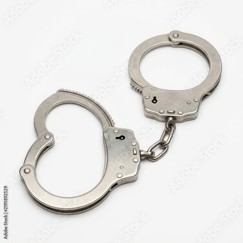 Metallic Handcuffs Symbolizing Justice and Law Enforcement