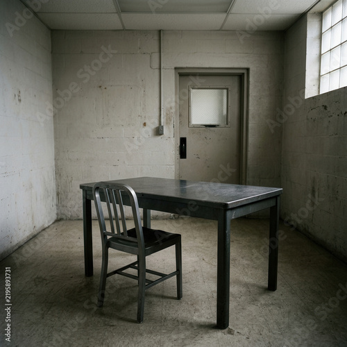 Minimalist Interrogation Room Table And Chair Scene