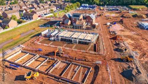 Canvastavla Aerial view of new build property construction in progress showing foundations a