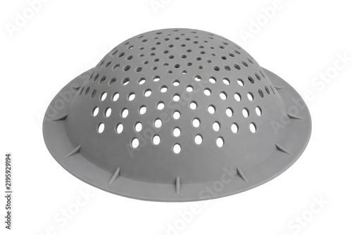 Fotografía Gray plastic sink strainer with numerous holes is captured from a high angle on