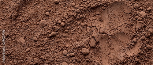 Close up of raw organic cocoa powder texture background