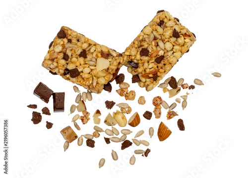 Granola bar broken into pieces with nuts and chocolate