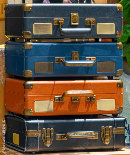 Stack of vintage suitcases with historical charm and retro travel aesthetic for tourism concept
