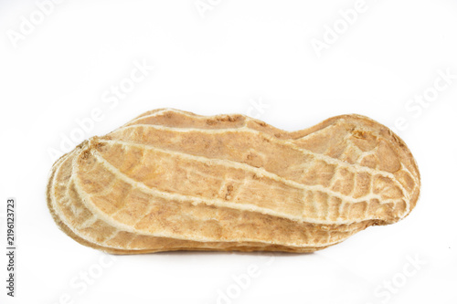  unpeeled peanut on white background