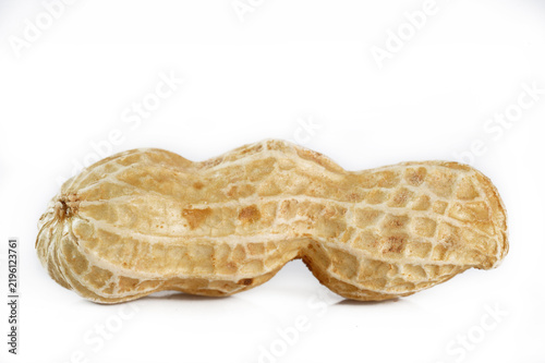  unpeeled peanut on white background