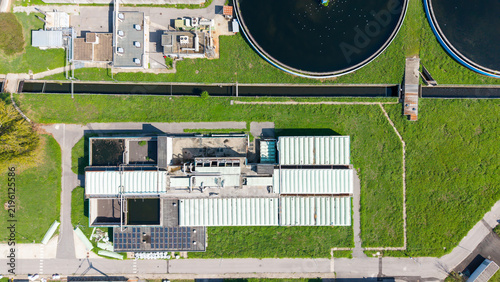 Aerial view of aeration basins being covered during wastewater treatment plant modernization, featuring infrastructure upgrades and odor control measures in Milan, Lombardy, Italy.