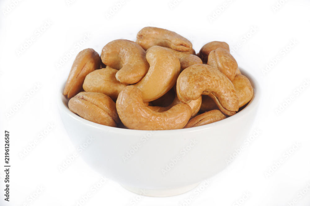 Fototapeta premium salted cashew nut in white bowl