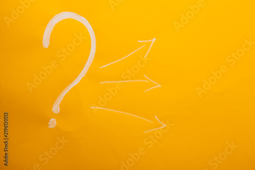 Question mark on a yellow background. The concept of questions and answers.