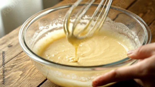 Baking Mixture Stirring in Glass Bowl in Home Kitchen
