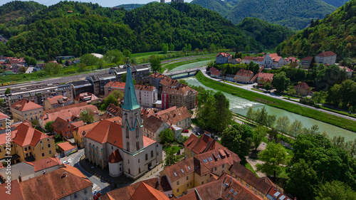 Фотография Aerial drone view looks down at dense historic center of Celje city