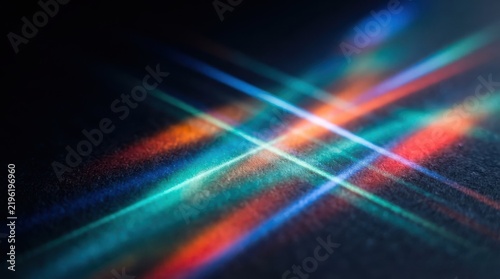 Abstract light trails with vibrant neon colors on dark background