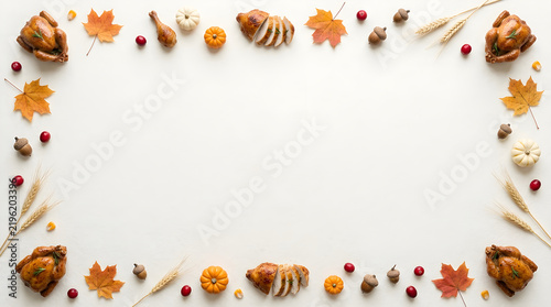 A festive thanksgiving border of autumn leaves berries and miniature gourds for a holiday celebration