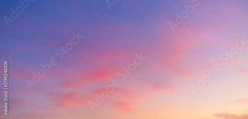 Fotografie Vibrant Sunset Sky Panorama with Colorful Orange Pink and Blue Clouds,A panorami