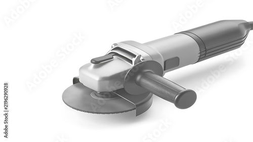 Angle grinder rests on a clean surface for industrial construction.