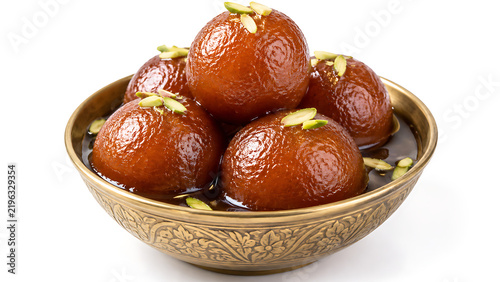 Gulab jamun in a bowl, soft syrup-soaked Indian dessert