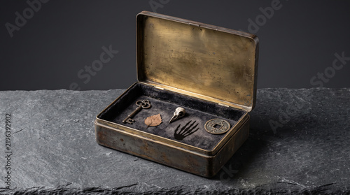 Antique Metal Curio Box Containing Miniature Macabre Artifacts and a Skeletal Hand Shadow